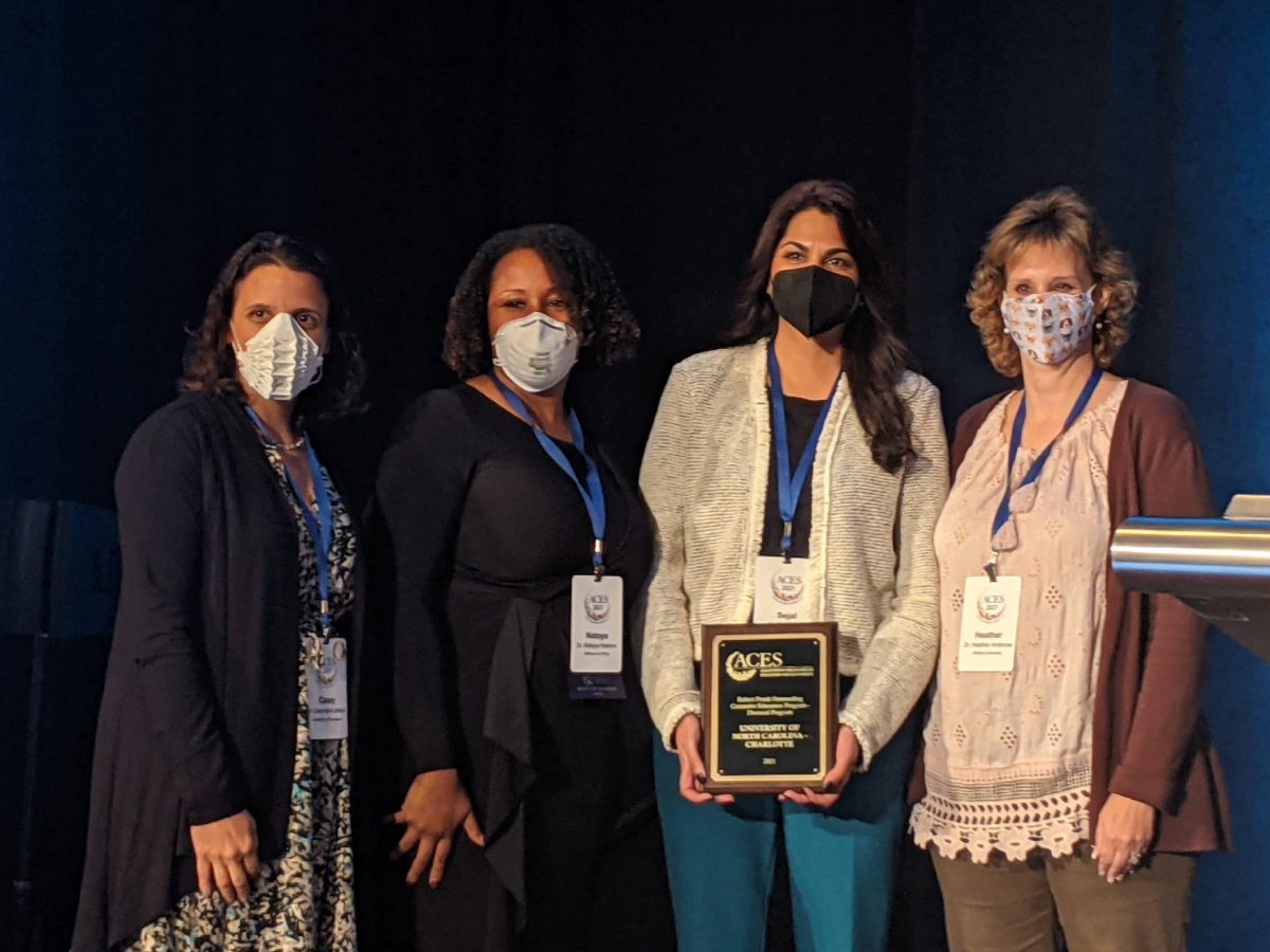 UNC Charlotte counseling faculty accept Robert Frank Outstanding Counselor Education Program Award from the Association for Counselor Education and Supervision